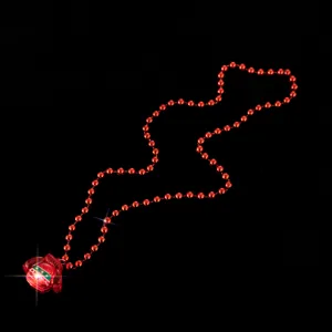 Collana con ciondolo luminoso a tema maglione di Natale rosso con catena di perle festive.