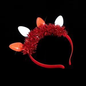 Light-up red tinsel headband for women, perfect festive party hair accessory and holiday costume.