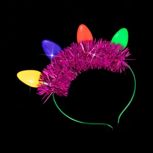 Christmas light bulb headband with pink tinsel festive hair accessory for holiday party wear