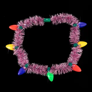 Christmas light-up pink tinsel necklace detail, colorful glowing bulbs, party festival accessory.