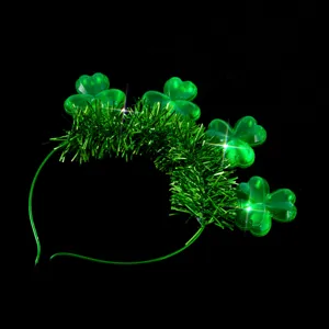 St. Patrick's Day green clover glowing headband detail, shiny tinsel and LED lights design.