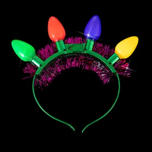 Light up Christmas headband with colorful LED bulbs and shiny tinsel for holiday party hair decor.