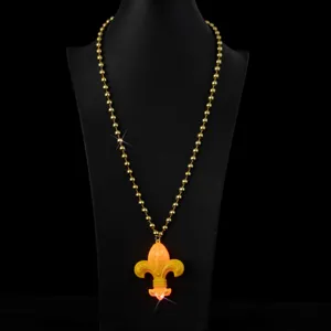 Detailed view of LED glowing carnival beaded necklace with decorative yellow pendant.