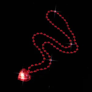 Detailed view of the red heart LED glowing pendant necklace, showcasing the bright light effects.