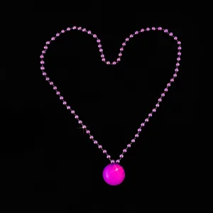 Glowing bead necklace with light up sphere pendant for party nightclub carnival night.