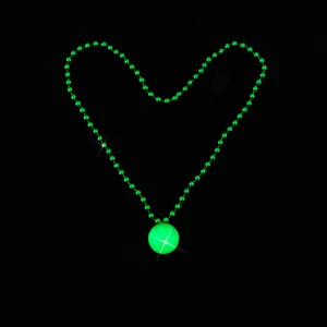 Green glowing bead necklace with sphere pendant, perfect for festival and party night.