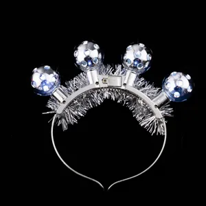Close-up detail of silver LED disco ball headband with tinsel trim, ideal for music festivals.