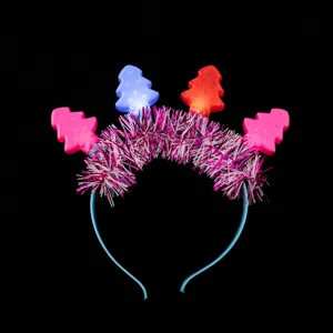 Christmas LED light-up headband festive tree tinsel hair hoop party accessory detail shot