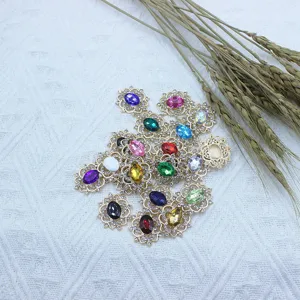 Detail view of colorful alloy rhinestone flower charms, perfect for DIY craft jewelry making.