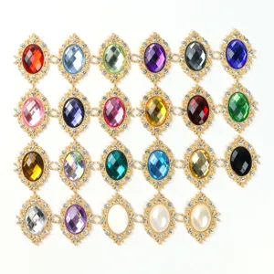 Detail view of colorful oval rhinestone alloy buttons, perfect for DIY jewelry and crafts.
