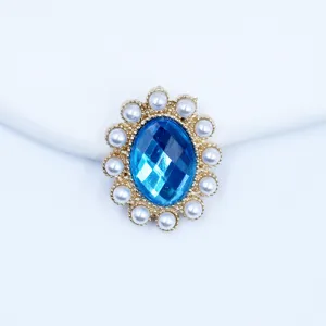 Oval blue rhinestone diy craft button with pearl and alloy base for decoration details.
