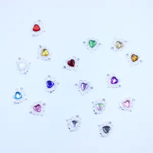 Close-up of 21x25mm heart-shaped rhinestone alloy DIY jewelry accessories and charms.