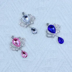 Close-up of sparkling rhinestone crown teardrop alloy pendant DIY accessories for craft.