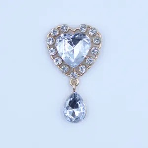 Gold alloy rhinestone heart charm pendant close-up, DIY jewelry making accessory detail view.