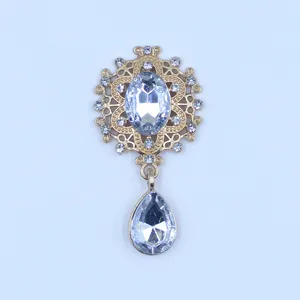 Rhinestone alloy brooch finding detail, vintage metal flower tray with clear crystal drops.