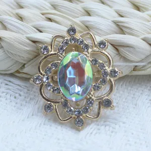 Gold alloy hollow rhinestone gem pendant DIY jewelry accessory detailed close up view elegant sparkle