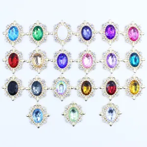Detailed view of colorful rhinestone pearl alloy DIY buttons, shiny crystal craft accessories.