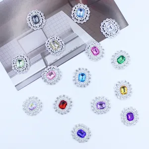 Close-up detail of alloy rhinestone flower buttons with colorful crystal centers for DIY crafts.