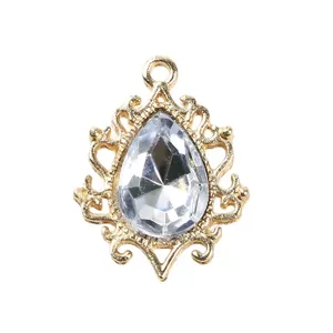 Gold hollow-out teardrop rhinestone pendant DIY jewelry making accessory main view.