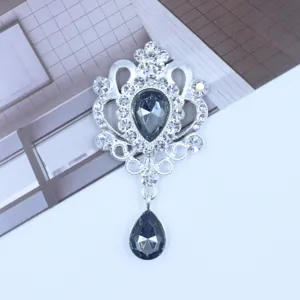 Silver rhinestone alloy teardrop pendant accessory, sparkling crystal details for DIY crafts.