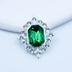 Close-up detail of silver diamond rhinestone decorative buckle for DIY shoes and clothing crafts.