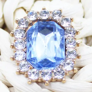 Blue crystal rhinestone button close-up, alloy gem diy decorative accessories for shoes crafts.