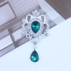 Close-up detail shot of silver alloy teardrop rhinestone pendant DIY decorative accessory.