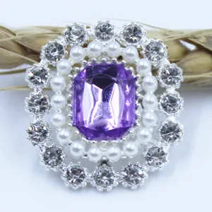 Alloy rhinestone flower base button detail, featuring central purple crystal and pearl surround.