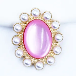 Gold alloy oval pink cat-eye stone pearl flower button DIY accessory detail close-up