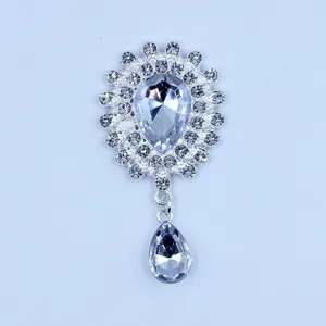 Silver alloy rhinestone acrylic pendant DIY clothing accessory decorative crystal button detail shot.
