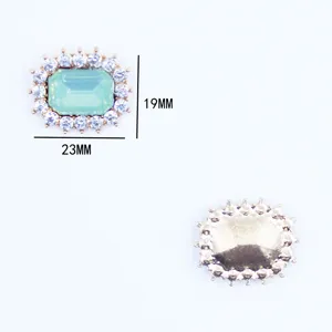 Detail view of rectangular rhinestone alloy flower tray button DIY hair bow accessory.