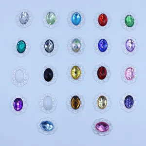 Oval rhinestone alloy hollow lace button DIY jewelry accessory detailed display with colorful gems.