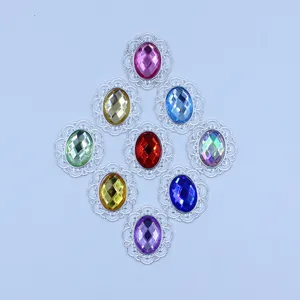 Oval rhinestone alloy buttons, colorful acrylic gems with silver filigree base for DIY crafts.