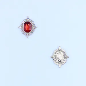 Detailed view of golden alloy rhinestone buckle detail for DIY crafts and doll accessories.