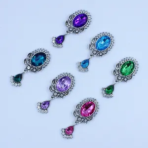 Close-up view of vintage antique silver alloy oval rhinestone acrylic crystal pendant details.