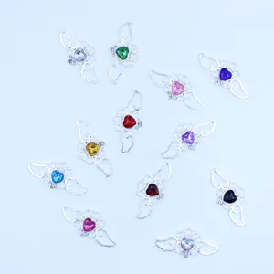 Silver alloy heart wing rhinestone DIY craft accessory detail view, perfect for handmade bows.