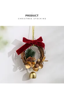 Exquisite handmade Christmas rattan wreath with red velvet bow and gold bell hanging detail.