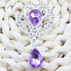 Alloy filigree flower pendant brooch with purple teardrop crystal for DIY handmade jewelry crafts.