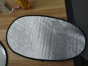 Motorcycle seat cushion reflective insulation pad, waterproof sunshade pad for summer use.