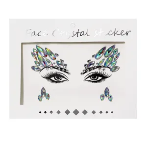 Close-up view of holographic face crystal stickers featuring sparkling acrylic rhinestones.