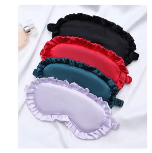 Mascherina per dormire in satin con bordo volant, benda elastica comoda per viaggi e riposo.