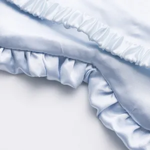 Maschera per dormire in satin azzurro con bordo volant e fascia elastica comoda viaggio