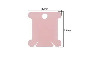 Pink plastic embroidery floss bobbin detail view with precise size dimensions of 35x38mm.