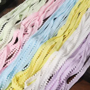 Colorful pom pom fringe trim in pastel shades, perfect for sewing DIY craft and apparel.