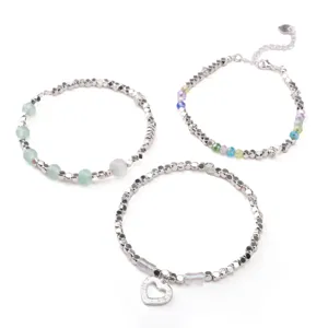 Silver alloy beaded charm bracelet set featuring heart pendant and colorful crystal beads for women.