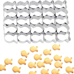 Stainless steel mini goldfish cookie cutter set detail showing shape and baked cookies.