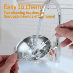 Detailed view of stainless steel funnel under running water with cleaning brush in action.