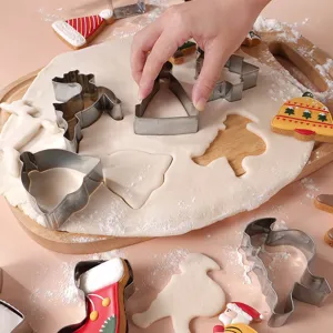 Stainless steel Christmas cookie cutters set, festive baking molds for holiday pastry DIY crafting.