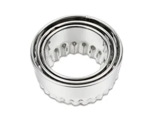 Stainless steel nested round dough cutter set with fluted edge for kitchen baking.