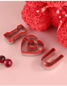 Stainless steel cookie cutter detail showing heart shapes and letters for DIY baking tools.